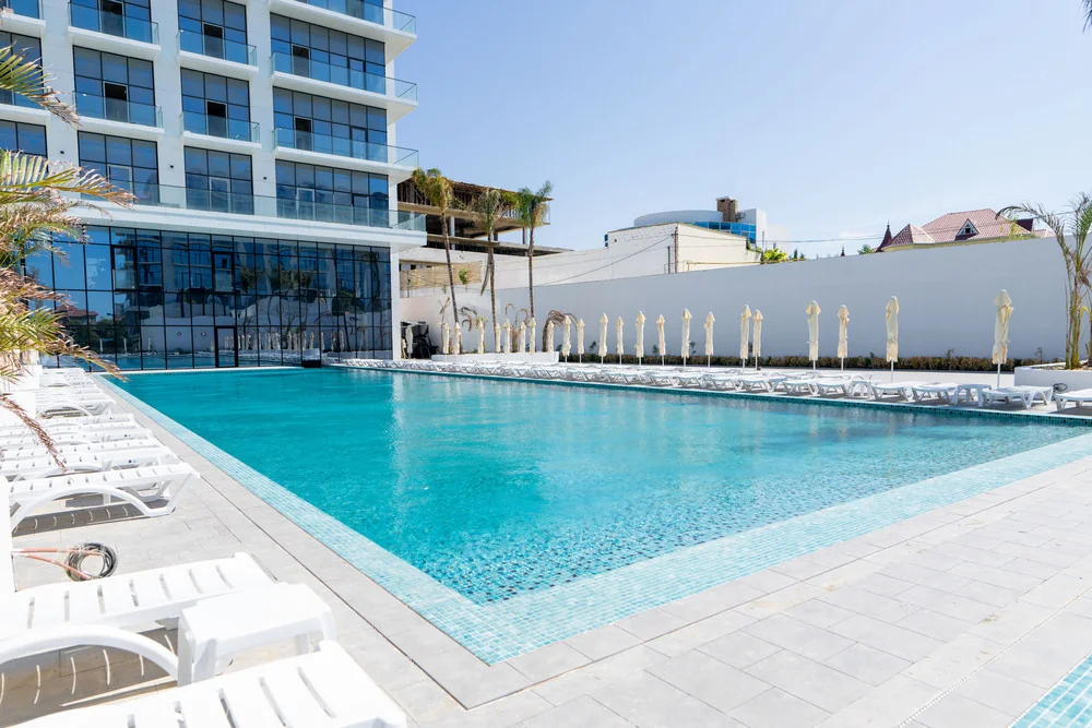 The club's open-air pool: lanes and umbrellas