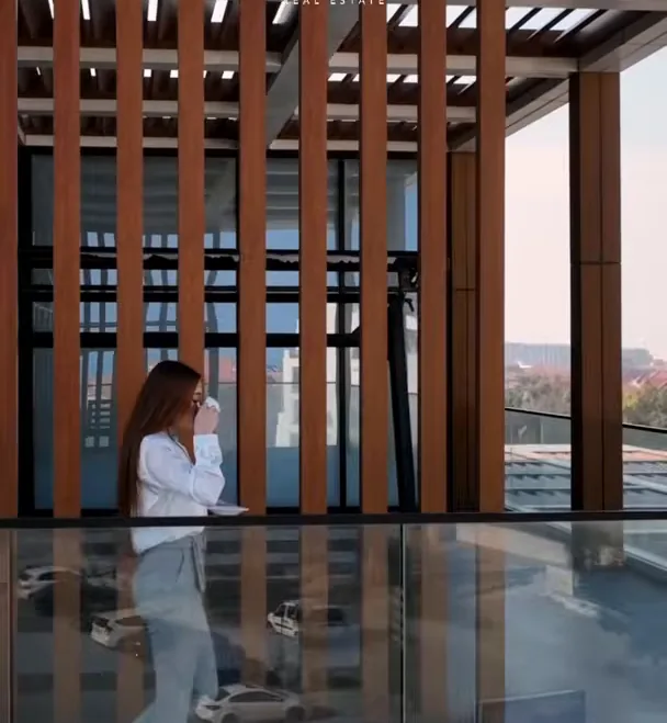 A stroll on the top-floor terrace of Lighthouse with a cup of coffee